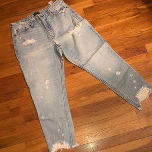 Distressed denim with rips